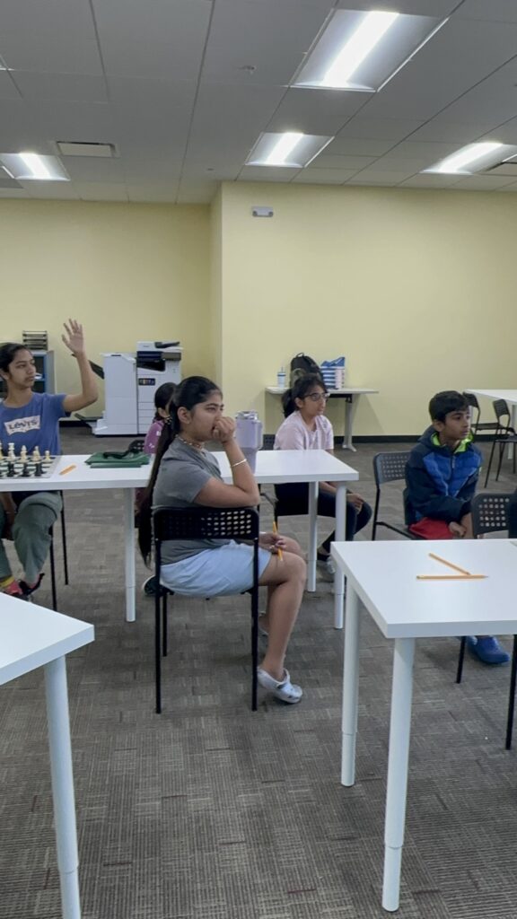 Students participating in chess camp at Y2L Academy.
